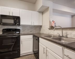 Model Kitchen at Jefferson Place Apartments in Irving, Texas, TX
