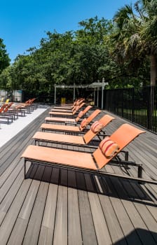 Sundeck and Pool at Reflections Apartment Homes in Gainesville, Florida, FL