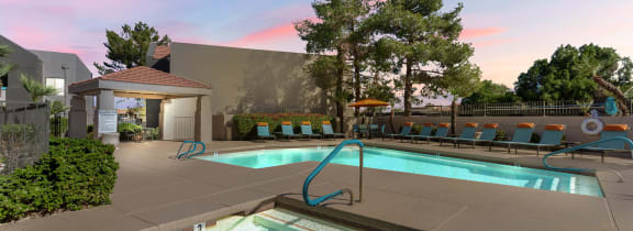 View of hot tub next to sparkling pool at Paseo 51, Glendale, AZ, 85302