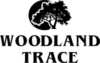 a logo of a tree and the words woodland trace