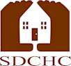 A graphic of a house with two hands on either side.