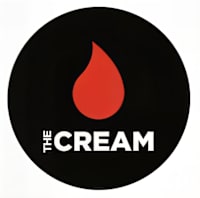 A black circle with a red flame and the words "The Cream" written in white.