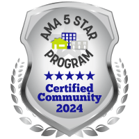 a silver and black award shield with the words programcertified community 1924 on it