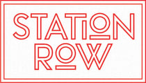 the logo for station row is shown in red on a white sign