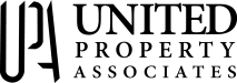 a black and white sign with the words united property associates