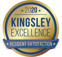 an image of a yellow and blue kingsley excellence logo, transparent png download