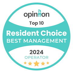 A badge indicating a top 10 resident choice for best management in 2024.