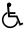 a silhouetted wheelchair icon on a green