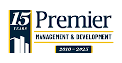 A logo for Premier Management & Development celebrating 15 years from 2010 to 2025.