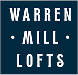 A blue sign with the words Warren Mill Lofts.