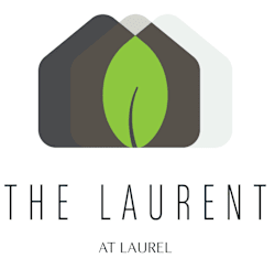A logo with a green leaf in the middle and the words at The Laurent at Laurel Apartments, Edmonton, AB, T6T 2T5