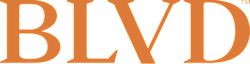 A solid orange background with no distinguishable objects.