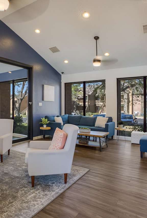 Resident lounge with couches and chairs at Mountain Run Apartments, Albuquerque, NM