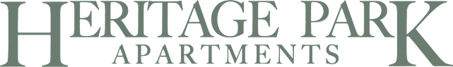 The image shows the text "Heritage Park Apartments" in large, bold letters.