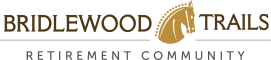 a logo for bridlewood retirement community with a horseshoe and the words