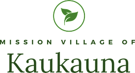 A logo with a leaf in a circle and the words "Mission Village of Kaukauna" below it.