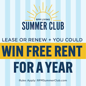 A poster advertises a chance to win free rent for a year by participating in the RPM Summer Club.