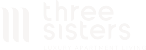 the white logo of the three sistersluxury apartments on a black background
