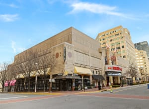 a large building on a city street at The Mark at Dulles Station, Herndon