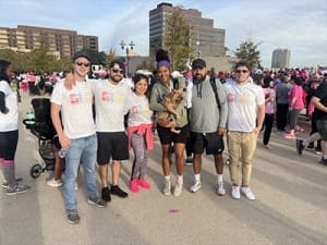 a group of people posing for a picture at a marathon