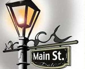 A street lamp with a sign that says Main St.