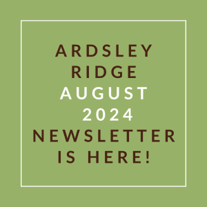 a green background with white text and the words… august