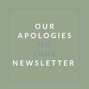 A poster with the words "Our Apologies No June Newsletter" written on it.