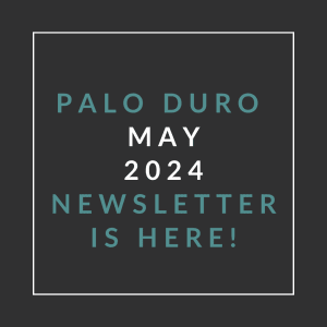 a white frame on a black background with the words palo duro april