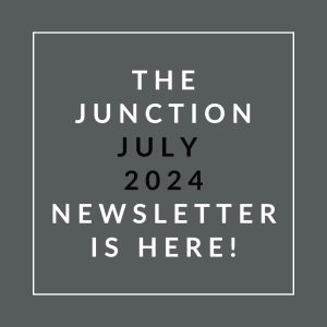 an illustration of a white font on a grey background with the words the junction juicy