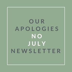 A sign that reads "Our Apologies No July Newsletter".