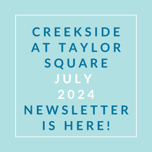 a white frame on a blue background with the text cheddar at taylor square
