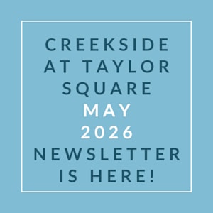 A blue poster with white text announcing the Creekside at Taylor Square newsletter for May 2026.