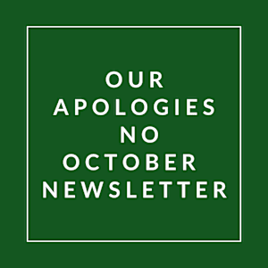A green poster with white text that reads "Our Apologies No October Newsletter".