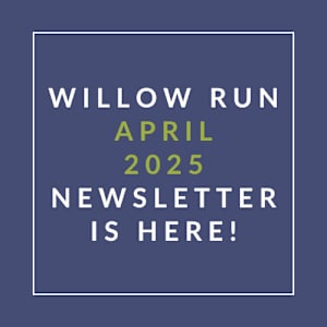 A blue poster with the text "Willow Run April 2025 Newsletter is here!" written in yellow and white.