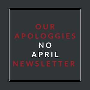 A poster with the text "Our Apologies No April Newsletter" written in red and white.