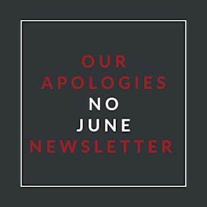 A black background with text that reads "Our Apologies No June Newsletter".