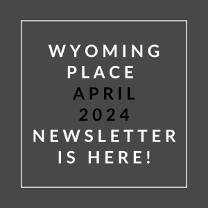a white frame on a black background with the text wounding place april 2024 newsletter