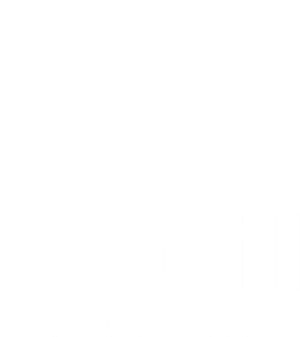 A black and white image of a train station sign for Woodhill Station East.