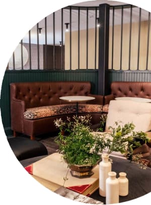 a living room filled with furniture and a table