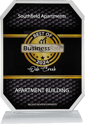 A black and gold award sign for Southfield Apartments.
