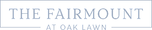 A black sign with white text that says "The Fairmont at Oak Lawn".