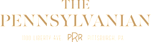 The logo for The Pennsylvania is displayed in gold on a black background. at The Pennsylvanian Apartments, Pittsburgh, Pennsylvania