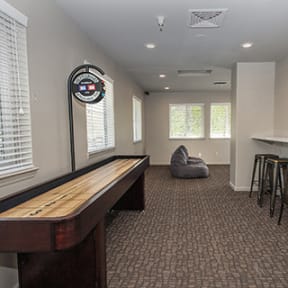 Game room with shuffle board