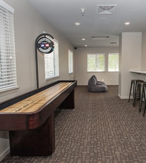 Game room with shuffle board