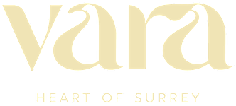 A logo with the text "vara" in gold and "heart of surrey" in smaller text below it.