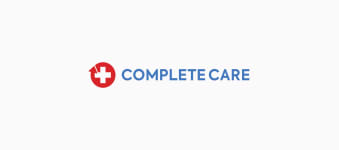 a logo for complete care with a red cross and the words complete care at The Landings at Brooks City-Base Apartments , Texas 78235