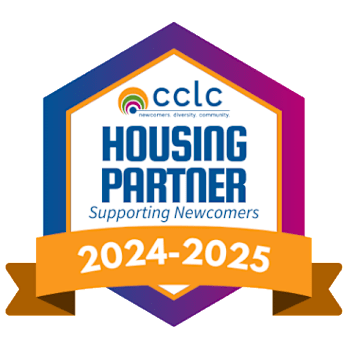 A logo for a housing partner supporting newcomers for the year 2024-2025.