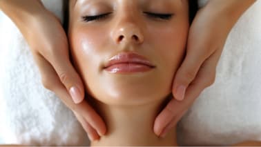 A person receiving a head massage.