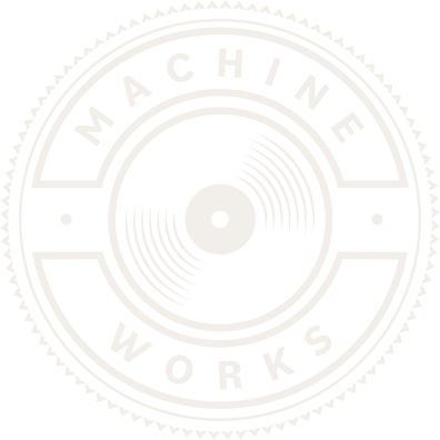 the album cover of machine works with a concentric circle on a white background