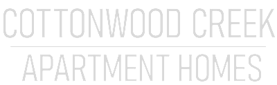 A green and white logo for Luma Apartments.